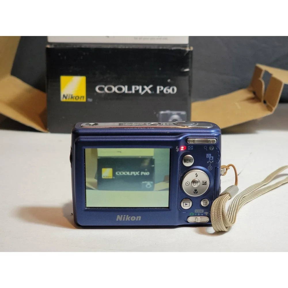 NIKON Coolpix P60 8.1 MP Digital Camera VR ISO 800 5x Zoom Blue Complete Works
